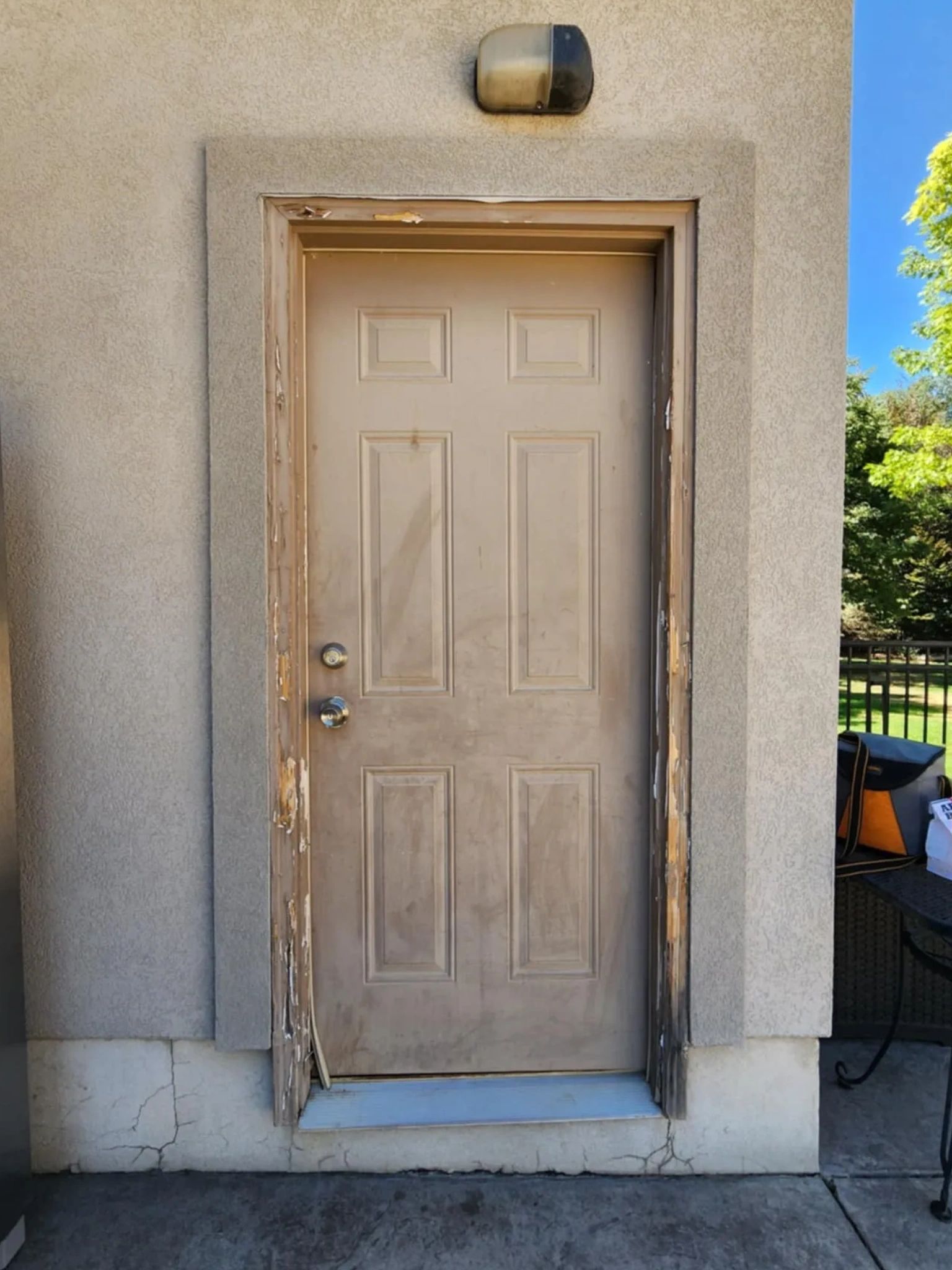 Exterior door frame weathered before restoration